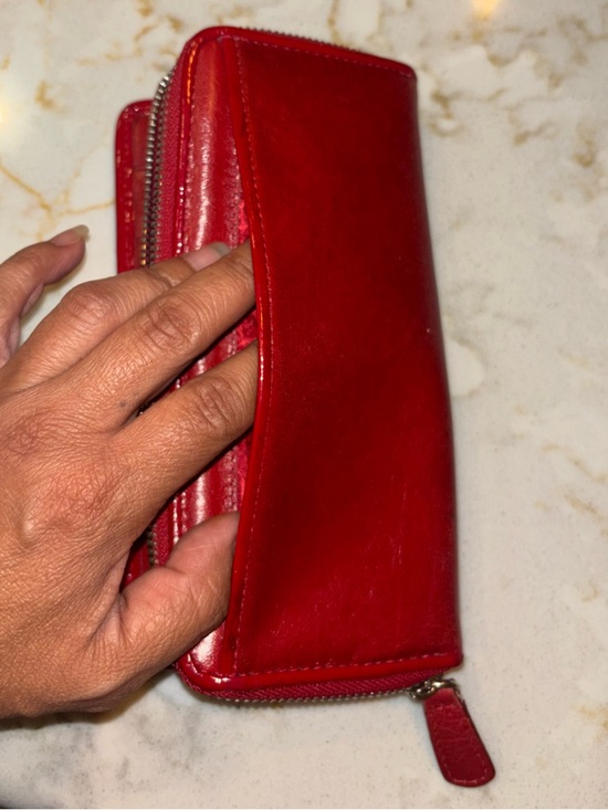 Brighton Red leather wallet featuring a decorative silver-toned snap closure. - Picture 5 of 16
